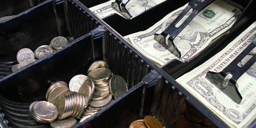 Cash register symbolizing financial transactions and commerce