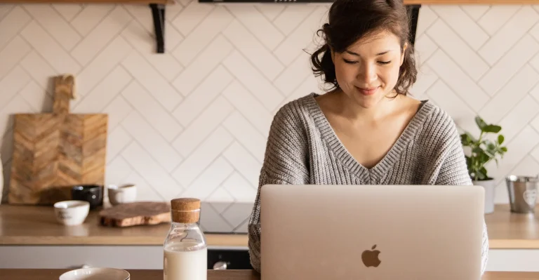 Woman receiving professional advice on accounting matters through a laptop